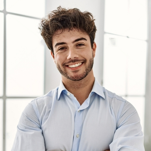 stock-photo-young-hispanic-businessman-smiling-happy-standing-with-arms-crossed-gesture-at-the-office-2210791857-transformed